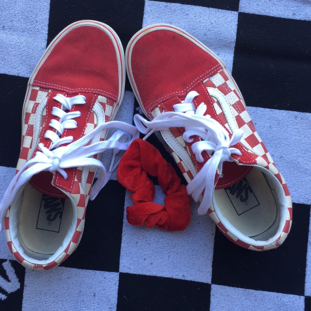 Red and white Vans shoes